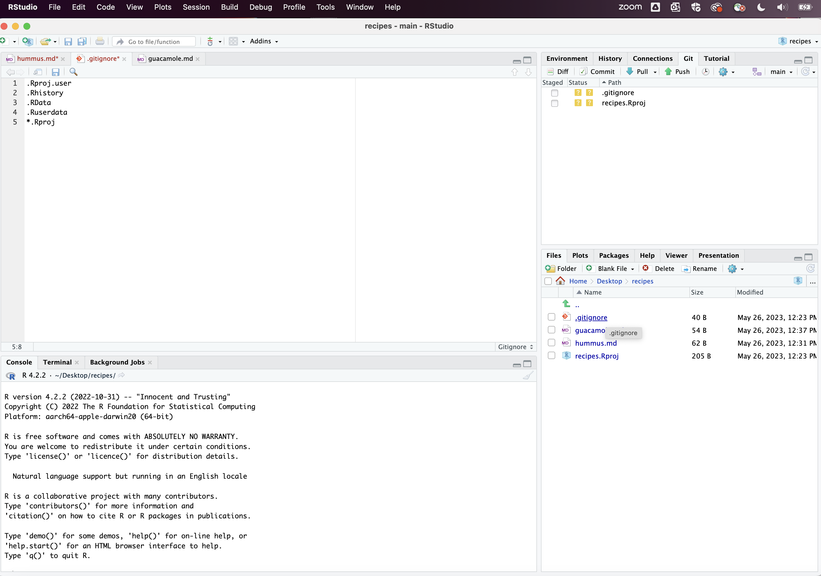 RStudio screenshot showing .gitignore open in the editor pane with the files .Rproj.user, .Rhistory, .RData, and *.Rproj added to the end